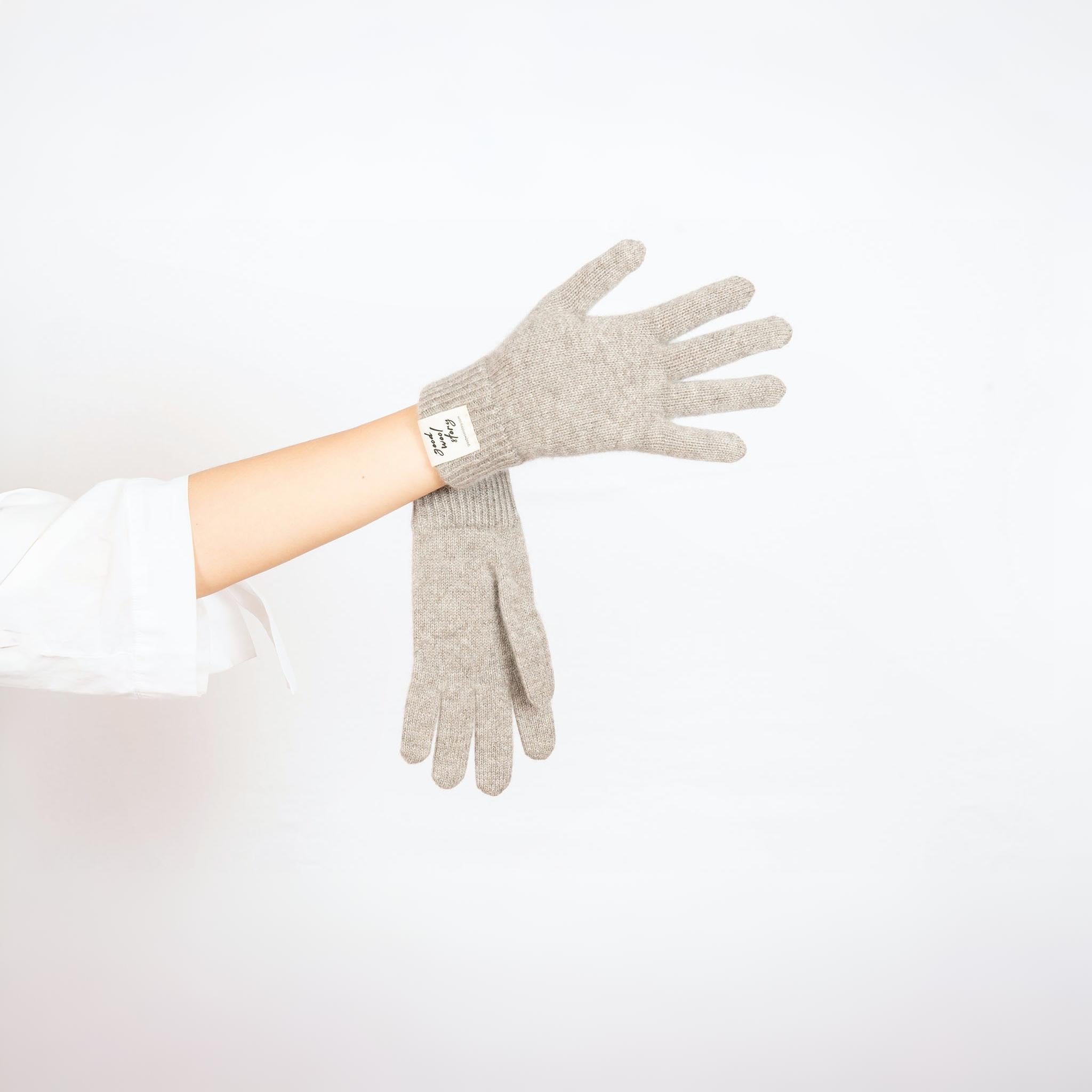 Gray glove on a white background