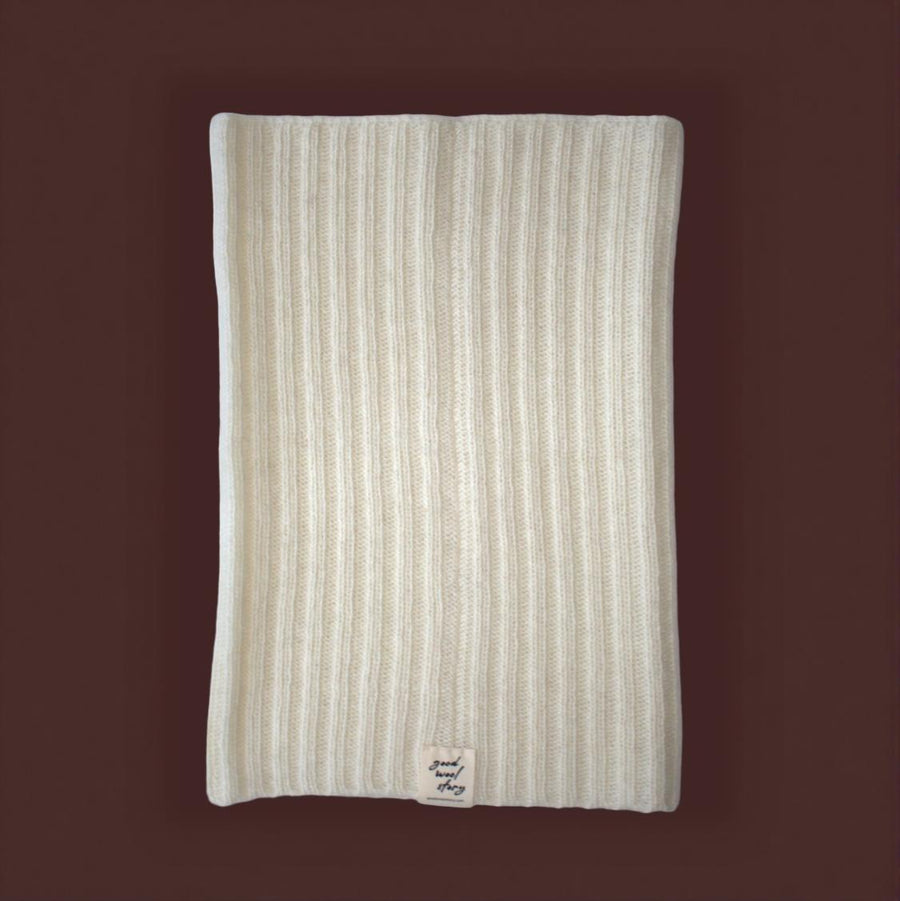 ivory white snood folded on white background