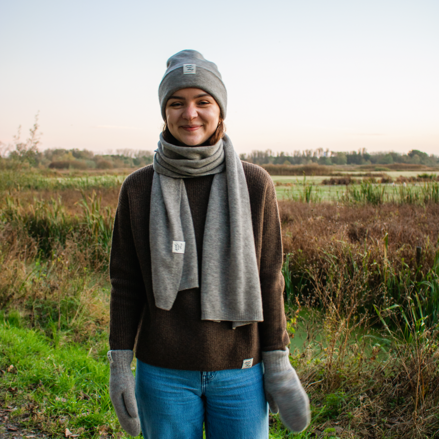 Gray beanie with a label on a white background