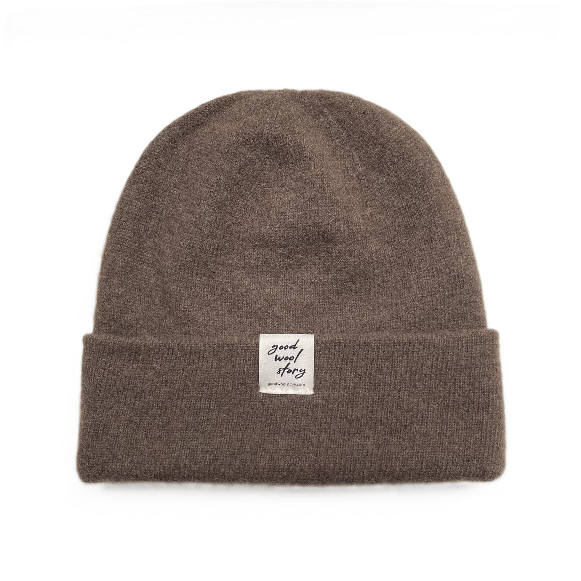 Gray beanie with a label on a black background