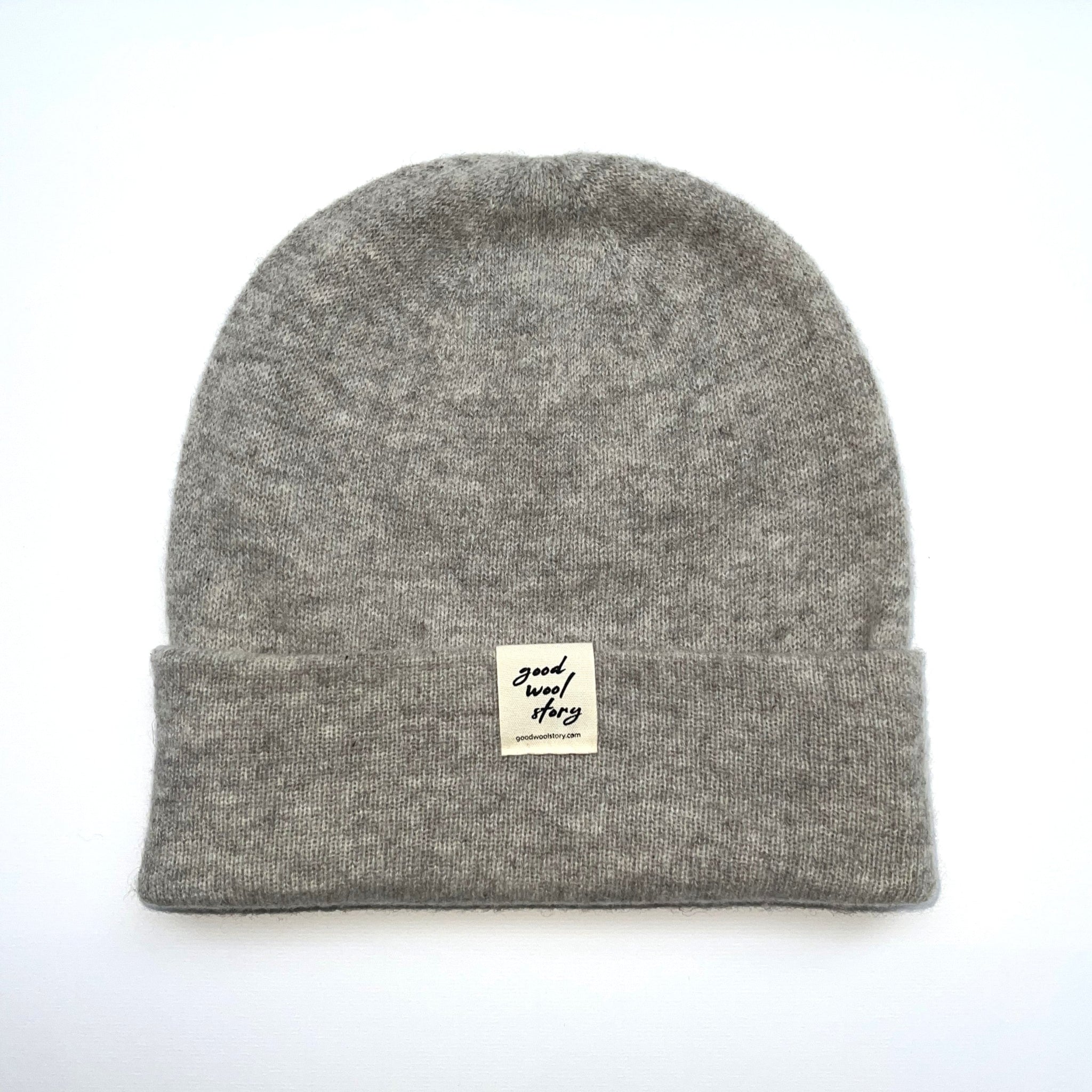 Gray beanie with a label on a white background