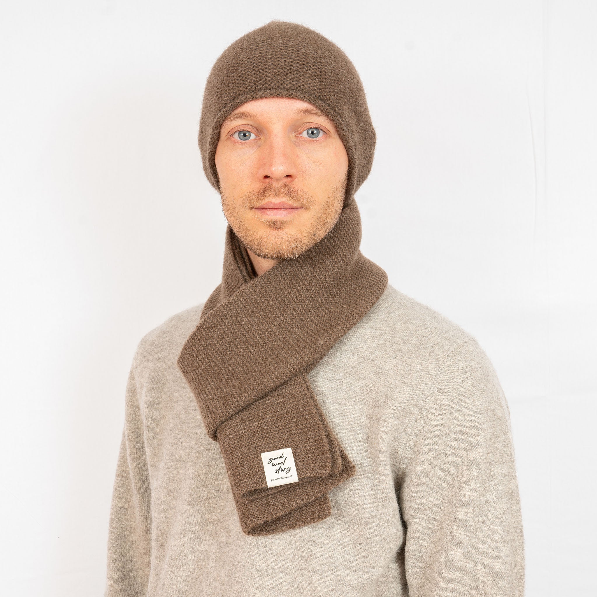 light brown knit beanie on a male model